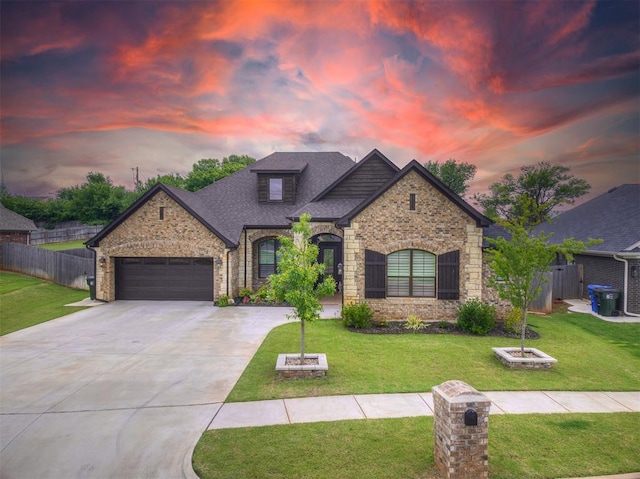 210 Bulverde Dr, Norman, OK 73069 - french provincial home featuring a garage, driveway, brick siding, stone siding, and a shingled roof
