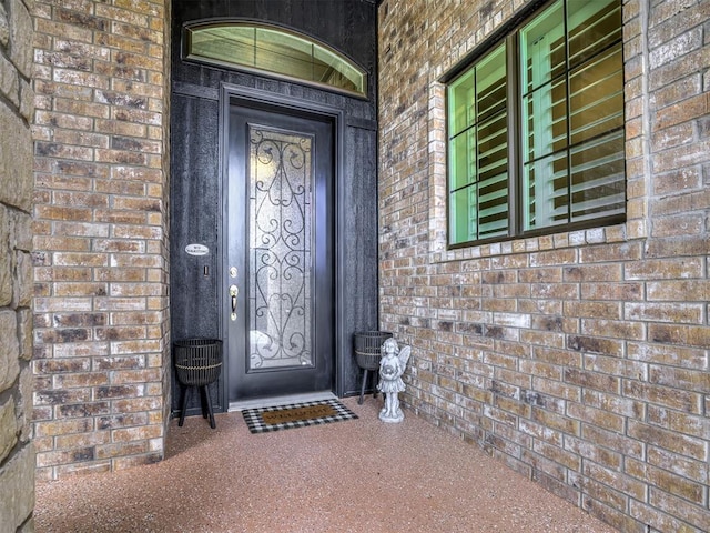 210 Bulverde Dr, Norman, OK 73069 - doorway to property with brick siding