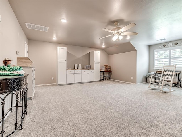210 Bulverde Dr, Norman, OK 73069 - bonus room featuring ceiling fan, light carpet, and vaulted ceiling