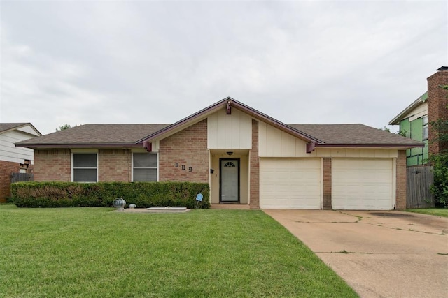 809 N Southminster St, Moore, OK 73160 - view of front of property featuring brick siding, driveway, a garage, and a front lawn