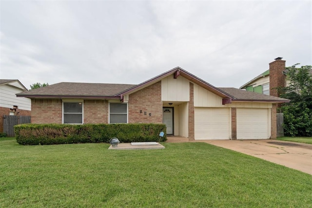 809 N Southminster St, Moore, OK 73160 - view of front of property with brick siding, a garage, a front yard, and concrete driveway