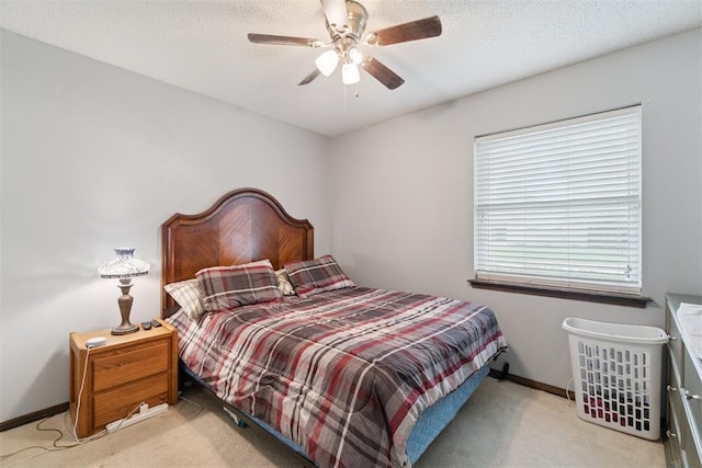 809 N Southminster St, Moore, OK 73160 - bedroom with light colored carpet, ceiling fan, and a textured ceiling