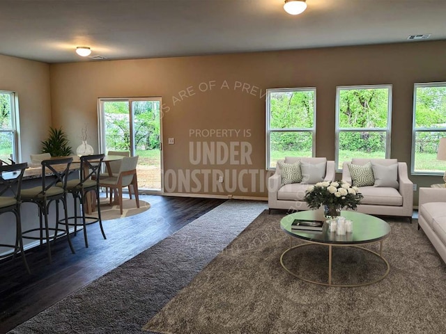 3629 Pete St, Yukon, OK 73064 - living room with wood finished floors and baseboards