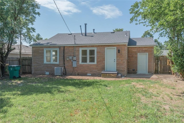 933 SW 50th St, Oklahoma City, OK 73109 - rear view of house with a shingled roof and crawl space