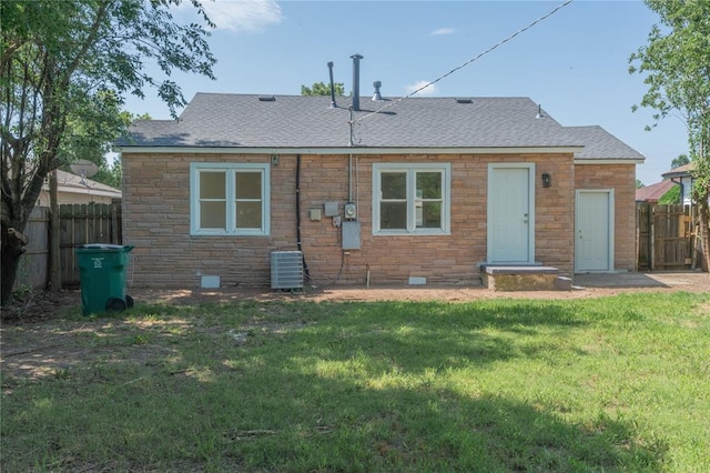 933 SW 50th St, Oklahoma City, OK 73109 - back of property with a shingled roof and stone siding
