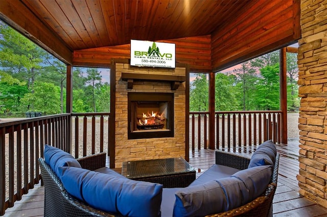 232 Orange Grove Rd, Broken Bow, OK 74728 - deck with an outdoor stone fireplace