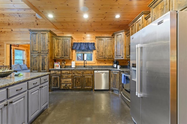 232 Orange Grove Rd, Broken Bow, OK 74728 - kitchen featuring appliances with stainless steel finishes, finished concrete flooring, wood ceiling, wooden walls, and recessed lighting