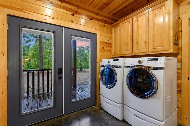 232 Orange Grove Rd, Broken Bow, OK 74728 - laundry room with washer and dryer, wood ceiling, cabinet space, and wooden walls
