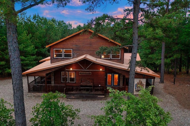 232 Orange Grove Rd, Broken Bow, OK 74728 - back of property featuring faux log siding and a porch