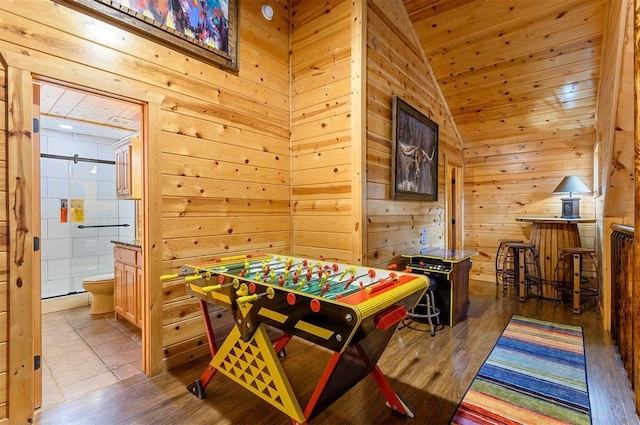 232 Orange Grove Rd, Broken Bow, OK 74728 - playroom featuring wood walls, lofted ceiling, wood finished floors, and wood ceiling