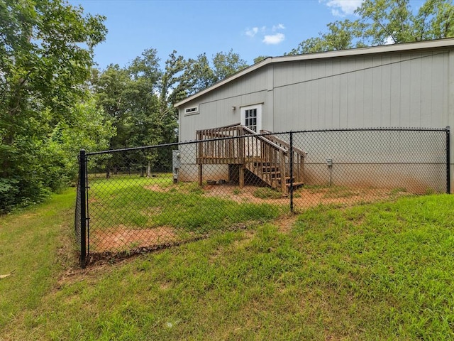view of home's exterior featuring a wooden deck and stairs