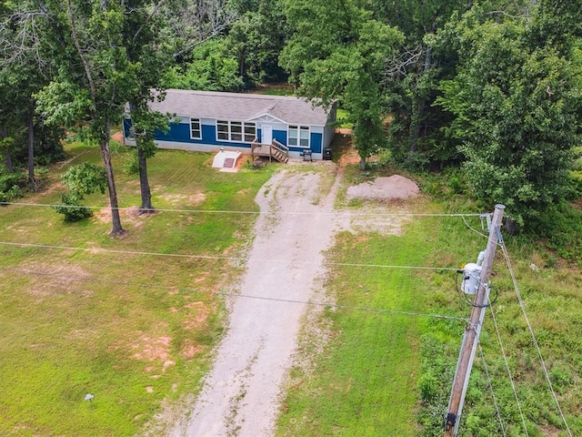 view from above of property featuring a forest