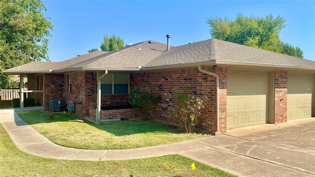 223 E Lincoln Ave, Edmond, OK 73034 - view of side of property featuring an attached garage, brick siding, a yard, concrete driveway, and roof with shingles