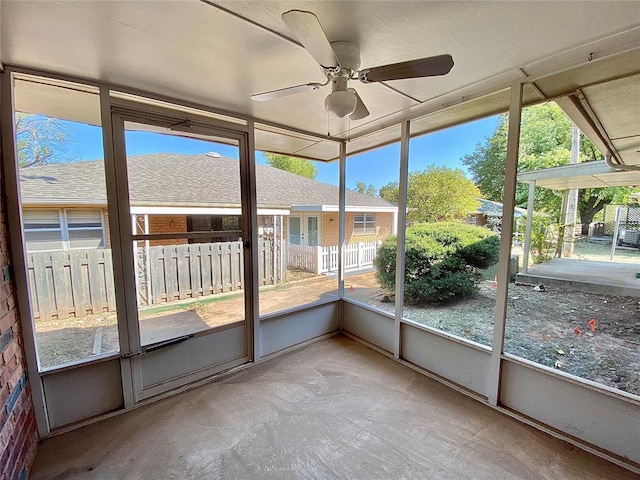 223 E Lincoln Ave, Edmond, OK 73034 - unfurnished sunroom with ceiling fan and plenty of natural light