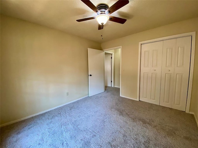 223 E Lincoln Ave, Edmond, OK 73034 - unfurnished bedroom with carpet flooring, a ceiling fan, and a closet