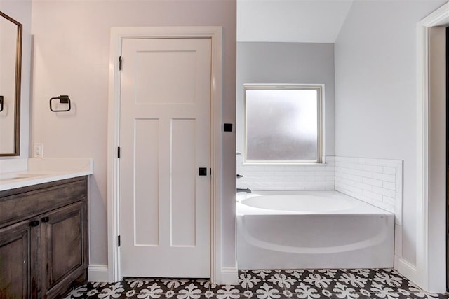 2408 NW 179th St, Edmond, OK 73012 - bathroom with a bath, vanity, and tile patterned flooring
