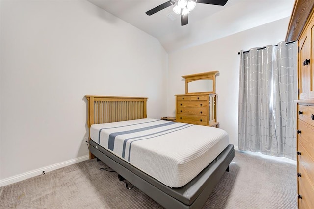 2408 NW 179th St, Edmond, OK 73012 - bedroom with vaulted ceiling, light colored carpet, and ceiling fan