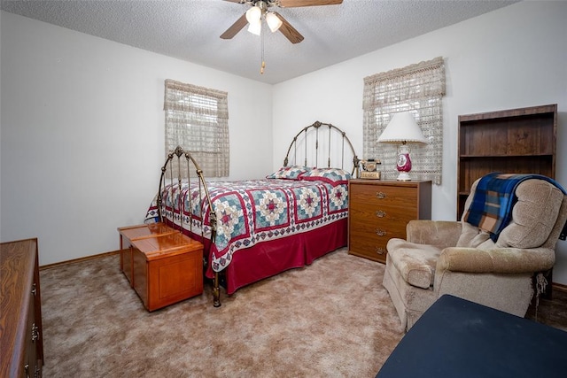 29877 Fishmarket Rd, Macomb, OK 74852 - bedroom with carpet floors, a textured ceiling, and ceiling fan