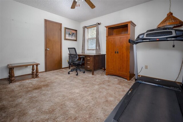 29877 Fishmarket Rd, Macomb, OK 74852 - office featuring ceiling fan, light carpet, and a textured ceiling