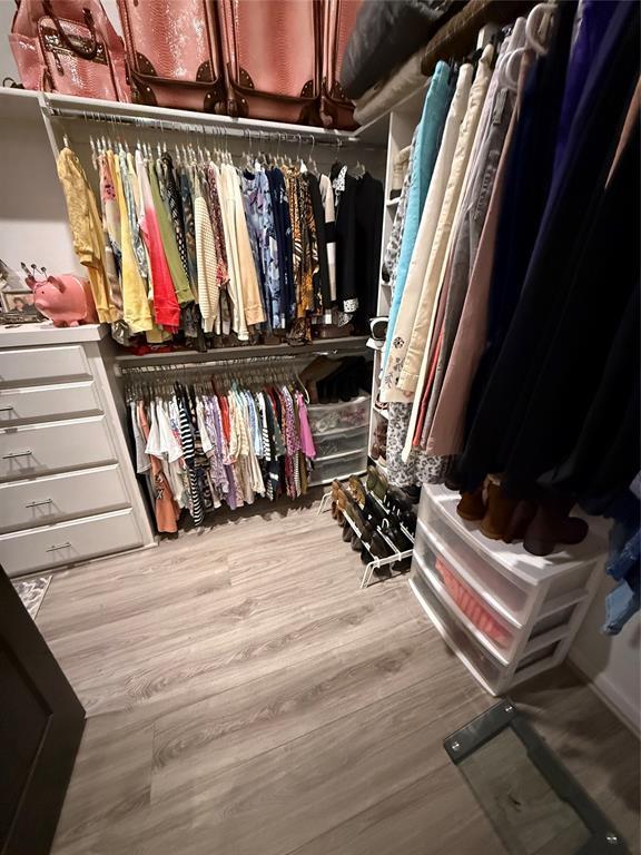 105967 S Rolling Hills Dr, Meeker, OK 74855 - spacious closet with wood finished floors