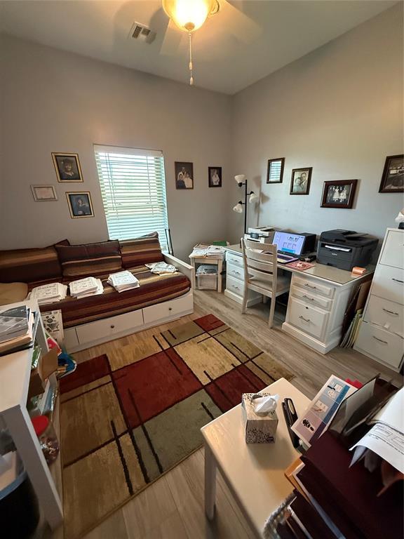 105967 S Rolling Hills Dr, Meeker, OK 74855 - office area featuring light wood-style flooring and ceiling fan