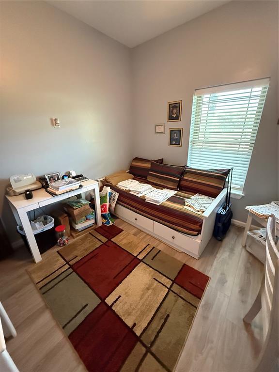 105967 S Rolling Hills Dr, Meeker, OK 74855 - bedroom featuring wood finished floors