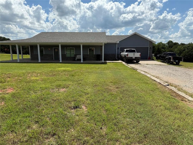 105967 S Rolling Hills Dr, Meeker, OK 74855 - ranch-style home with covered porch, driveway, a front yard, and a garage