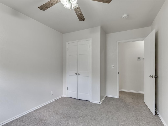 216 S 5th St, Noble, OK 73068 - unfurnished bedroom featuring carpet flooring, a closet, and ceiling fan