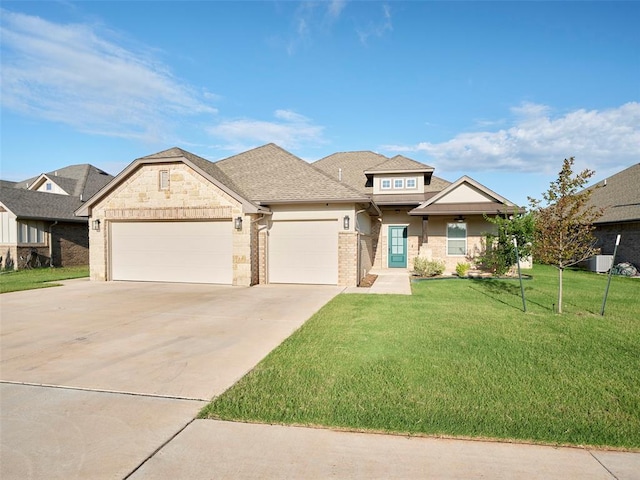 2105 N Fork Dr, Moore, OK 73160 - view of front of property with a front yard, concrete driveway, an attached garage, brick siding, and a shingled roof