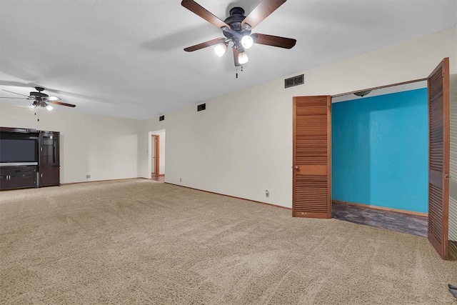 315 W 6th St, Cordell, OK 73632 - unfurnished living room with ceiling fan and carpet flooring