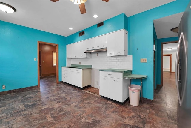315 W 6th St, Cordell, OK 73632 - kitchen with ceiling fan, tasteful backsplash, white cabinetry, stainless steel refrigerator with ice dispenser, and recessed lighting
