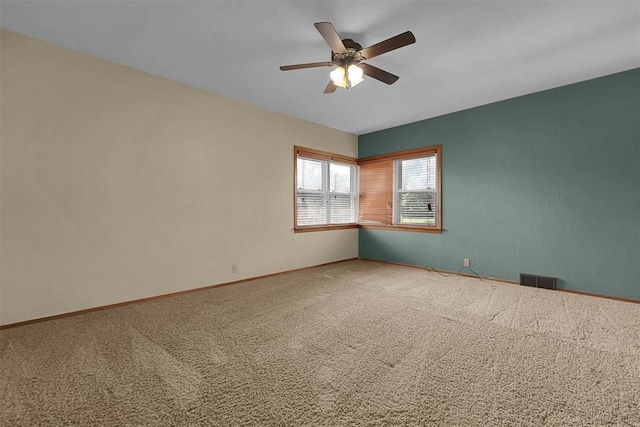 315 W 6th St, Cordell, OK 73632 - spare room with light colored carpet and ceiling fan