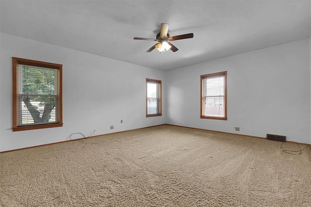 315 W 6th St, Cordell, OK 73632 - carpeted spare room featuring a ceiling fan and baseboards
