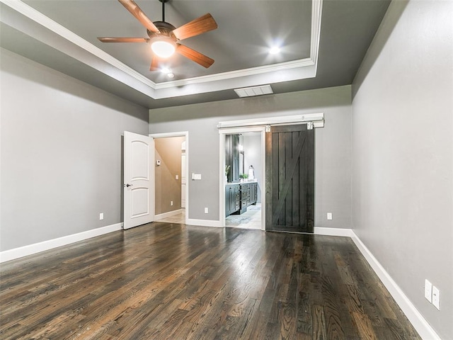 3009 Cordova Ct, Norman, OK 73072 - empty room featuring ornamental molding, a tray ceiling, wood finished floors, and ceiling fan