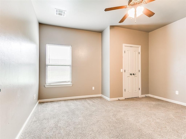 3009 Cordova Ct, Norman, OK 73072 - unfurnished room with carpet and ceiling fan