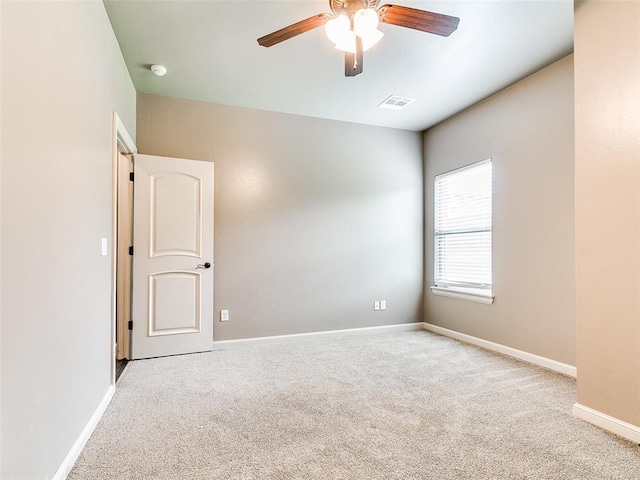 3009 Cordova Ct, Norman, OK 73072 - unfurnished room featuring a ceiling fan, carpet, and a smoke detector