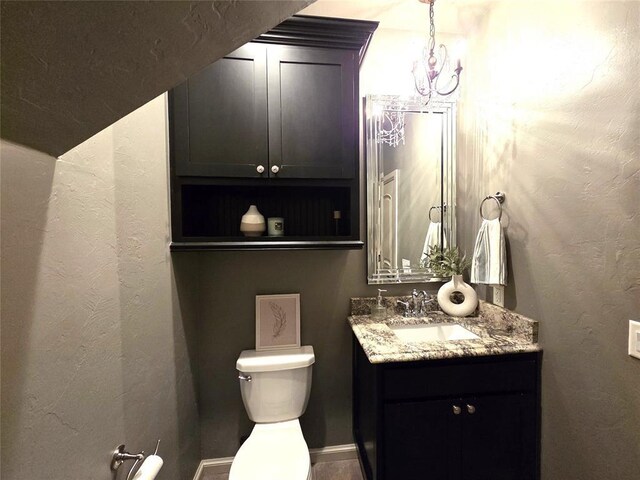 3009 Cordova Ct, Norman, OK 73072 - bathroom featuring vanity and a chandelier