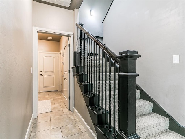 3009 Cordova Ct, Norman, OK 73072 - staircase featuring baseboards