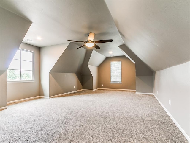 3009 Cordova Ct, Norman, OK 73072 - bonus room featuring carpet flooring, ceiling fan, and vaulted ceiling