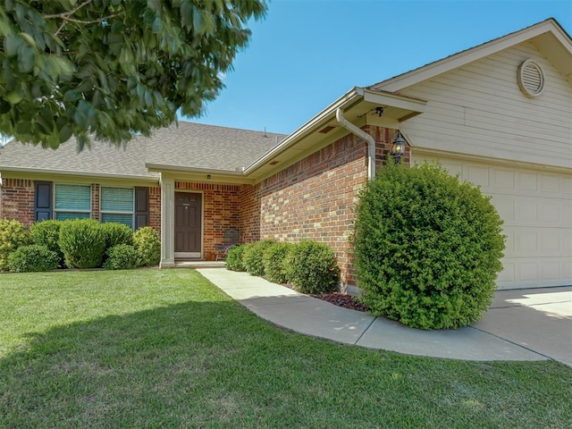 9505 SW 27th St, Oklahoma City, OK 73128 - view of front of house with brick siding, an attached garage, a front lawn, and a shingled roof
