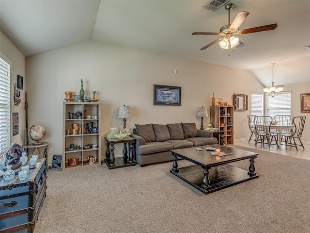 9505 SW 27th St, Oklahoma City, OK 73128 - carpeted living area featuring lofted ceiling, a chandelier, and ceiling fan