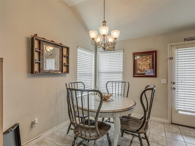 9505 SW 27th St, Oklahoma City, OK 73128 - dining room with a chandelier, healthy amount of natural light, vaulted ceiling, and light tile patterned flooring