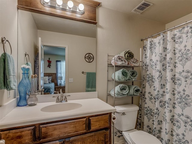 9505 SW 27th St, Oklahoma City, OK 73128 - ensuite bathroom featuring vanity and a shower with curtain