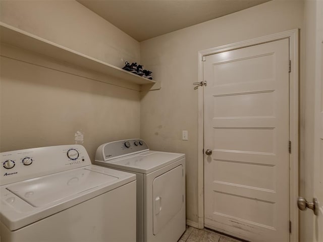 9505 SW 27th St, Oklahoma City, OK 73128 - washroom featuring washing machine and dryer and light tile patterned floors