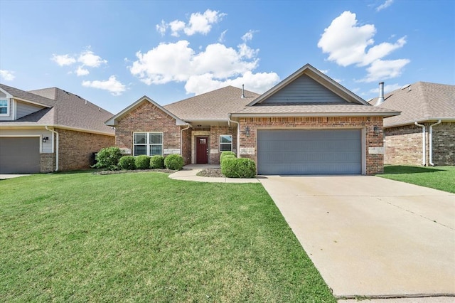 8309 NW 139th Ter, Oklahoma City, OK 73142 - view of front of home with an attached garage, brick siding, and a front yard