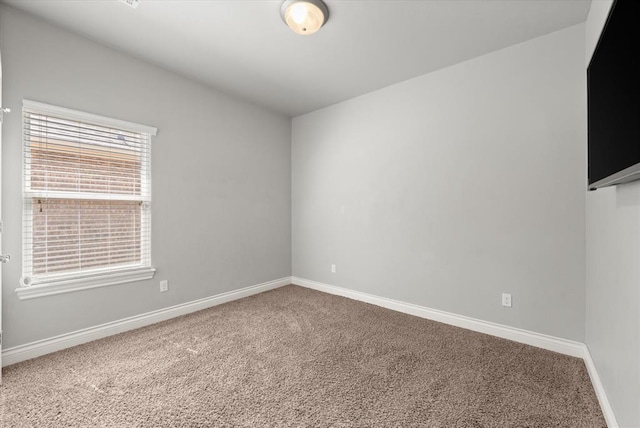 8309 NW 139th Ter, Oklahoma City, OK 73142 - carpeted spare room featuring baseboards