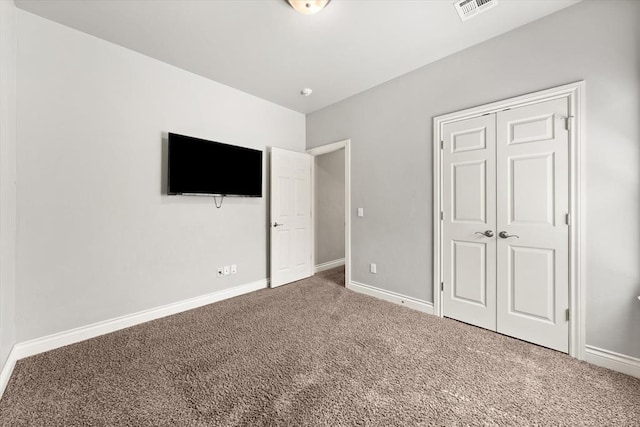 8309 NW 139th Ter, Oklahoma City, OK 73142 - unfurnished bedroom with carpet flooring and a closet
