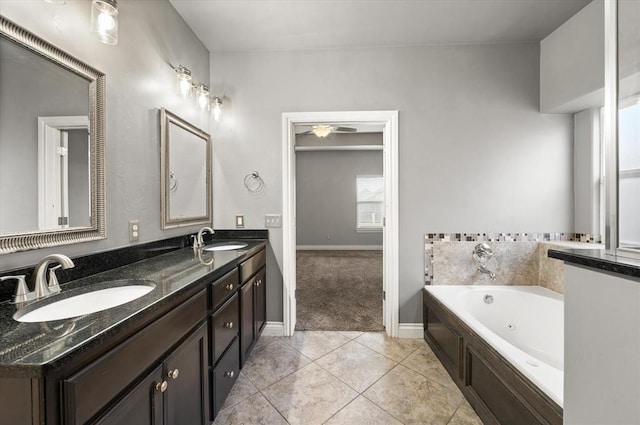 8309 NW 139th Ter, Oklahoma City, OK 73142 - full bathroom featuring double vanity, a tub with jets, and tile patterned flooring