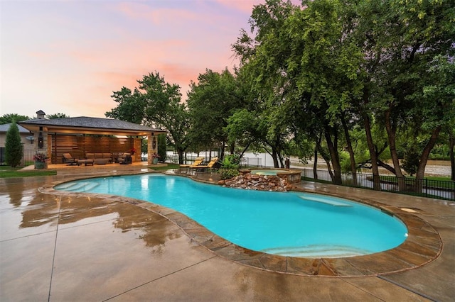 18816 Otter Creek Dr, Edmond, OK 73012 - view of pool with an outdoor hangout area, a gazebo, a patio, and a pool with connected hot tub
