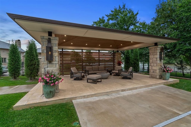 18816 Otter Creek Dr, Edmond, OK 73012 - view of patio / terrace with an outdoor living space and a gazebo